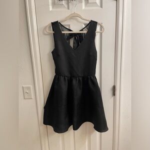 Black dress, size small. Mesh back with bow.